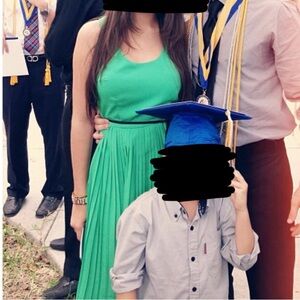 Ark & Co. Green pleated mini dress with tie around strap.